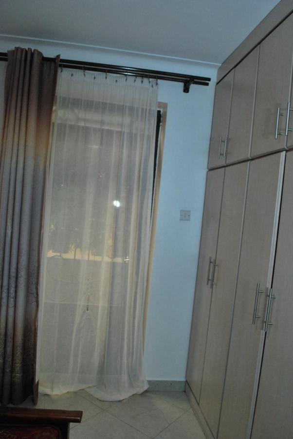 Jacuzzi City Home Kampala Bagian luar foto