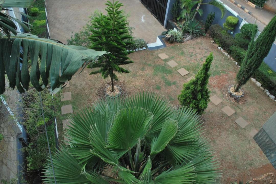 Jacuzzi City Home Kampala Bagian luar foto