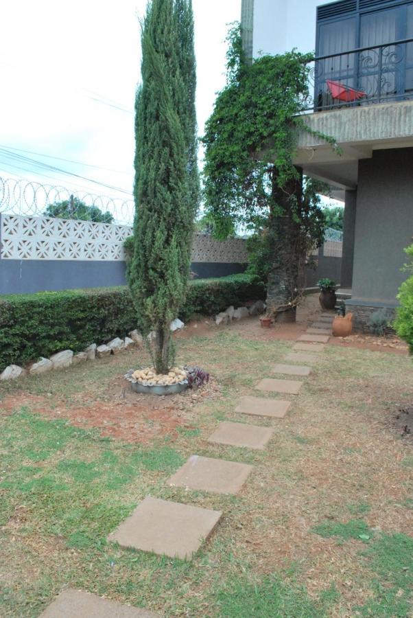 Jacuzzi City Home Kampala Bagian luar foto