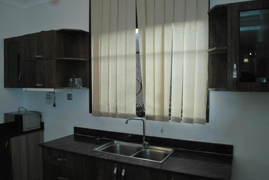 Jacuzzi City Home Kampala Bagian luar foto