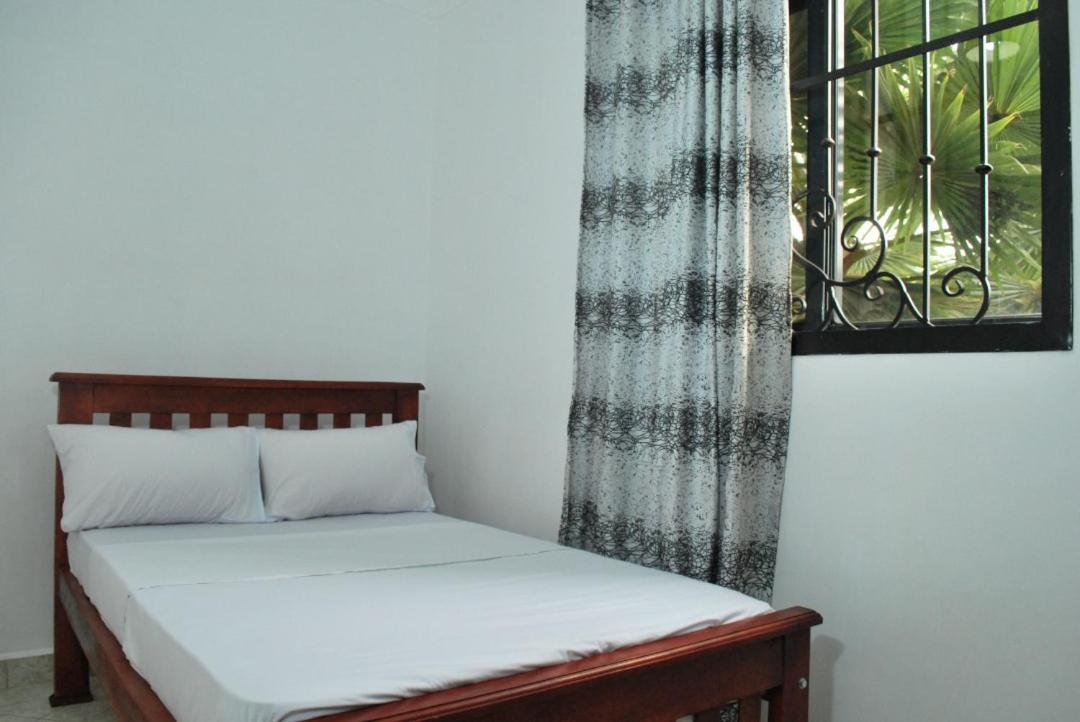 Jacuzzi City Home Kampala Bagian luar foto
